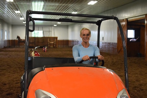 Elisabeth spends lots of time in the Kubota at Visser Stables, dragging the ring between horses.