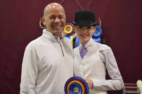 David Rudder congratulated his daughter Alex after she won the Junior Exhibitor Show Pleasure 14-17 Championship aboard Kalarama's Prospero.