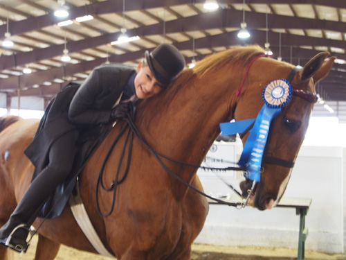 Sydney Young won Saddle & Bridle's Pleasure Equitation Medallion.