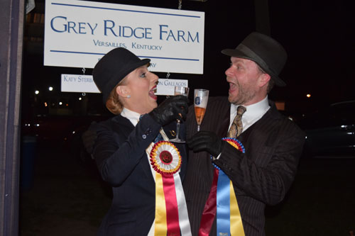 Michael Petty and Michelle Partridge toast each other after taking champion and reserve in the Adult Show Pleasure Championship.