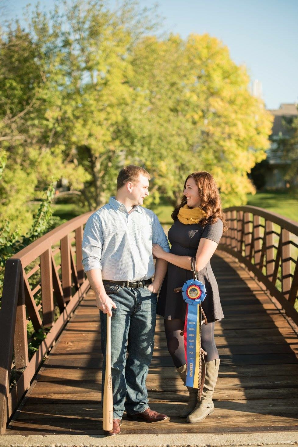 One of our engagement photos, portraying both our interests, baseball and horses. Photo by Anaberry Images. 